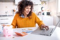 Happy black woman checking her good credit score online Royalty Free Stock Photo