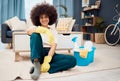 Happy black woman, cleaning living room and relax taking break from housework, home hygiene routine and spring clean Royalty Free Stock Photo