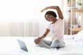 Happy black woman making morning exercise at home Royalty Free Stock Photo