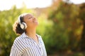 Happy black woman meditating listening audio guide Royalty Free Stock Photo