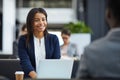 Happy black woman meeting with business partner