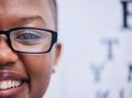 Happy, black woman and portrait with glasses from eye exam, eyesight test or prescription eyewear from optometrist. Half Royalty Free Stock Photo