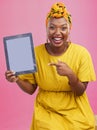 Happy black woman, portrait and pointing to tablet mockup in advertising against a studio background. African female Royalty Free Stock Photo