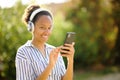 Happy black woman posing listening to music Royalty Free Stock Photo