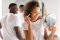 Happy Black Young Couple Getting Ready Together In Modern Bathroom Royalty Free Stock Photo