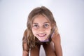 Happy blond girl looking at the camera from front Royalty Free Stock Photo