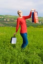 Happy blond Girl With Shopping Bags Royalty Free Stock Photo