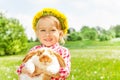 Happy blond girl with yellow flowers circlet