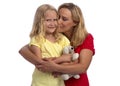 Happy blond mother and daughter hugging