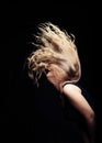 Happy blonde dancer woman profile with wind in long hair Royalty Free Stock Photo