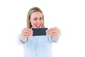 Happy blonde taking a selfie with smartphone