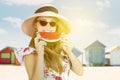 Happy blonde woman eating watermelon at beach Royalty Free Stock Photo