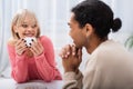 happy blonde woman holding cup and Royalty Free Stock Photo