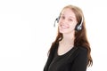 Happy blonde woman over isolated white background working callcenter agency with headset phone