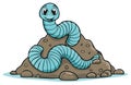Happy blue cartoon earthworm character sitting on a mound of soil Royalty Free Stock Photo