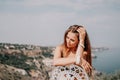 Happy boho woman portrait. Boho chic fashion style. Outdoor photo of free happy woman with long hair, sunny weather