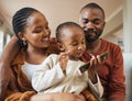 Happy, bonding and family time with a black family on a video call. Young parents being affectionate with their baby Royalty Free Stock Photo