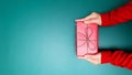 Happy Boxing Day, young woman hand with a gift box offer to receiver