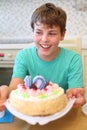 Happy boy with birthday cake in the Royalty Free Stock Photo