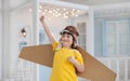 Happy boy with cardboard boxes of wings Royalty Free Stock Photo