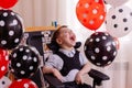 Happy Boy with cerebral palsy celebrates his birthday Royalty Free Stock Photo