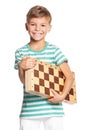 Boy with chessboard Royalty Free Stock Photo