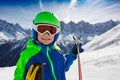 Happy boy close portrait with ski over mountains Royalty Free Stock Photo