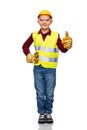 happy boy in construction helmet showing thumbs up Royalty Free Stock Photo