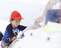 Happy boy driving a boat Royalty Free Stock Photo