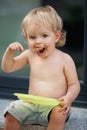 Happy boy eating chocolate cake Royalty Free Stock Photo