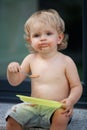 Happy boy eating chocolate cake Royalty Free Stock Photo