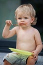 Happy boy eating chocolate cake Royalty Free Stock Photo