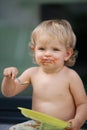 Happy boy eating chocolate cake Royalty Free Stock Photo