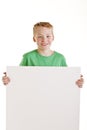 Happy boy with the empty blank sign Royalty Free Stock Photo