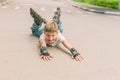 Happy boy faving fun on roller scates on natural backgroun Royalty Free Stock Photo