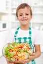 Happy boy with fresh salad - healthy nutrition Royalty Free Stock Photo