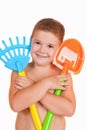 Happy boy with gardening tools Royalty Free Stock Photo