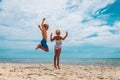 Happy boy and girl enjoy beach, kids play on sea vacation Royalty Free Stock Photo