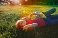 Happy boy and girl have fun at sunset, kids enjoy nature Royalty Free Stock Photo