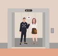 Happy boy and girl or romantic partners standing in elevator with open doors and talking to each other. Love confession Royalty Free Stock Photo