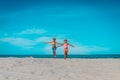 Happy boy and girl run at beach, kids play on tropical vacation Royalty Free Stock Photo