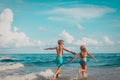 Happy boy and girl run play at beach Royalty Free Stock Photo