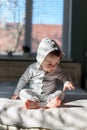 Happy boy in grey pyjamas Royalty Free Stock Photo