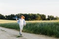 Happy boy holding airplane toy during running Royalty Free Stock Photo