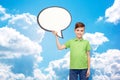 Happy boy holding blank white text bubble banner Royalty Free Stock Photo