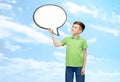 Happy boy holding blank white text bubble banner