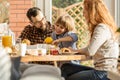 Lovely family eating breakfast