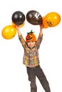 Happy boy holding Halloween balloons Royalty Free Stock Photo