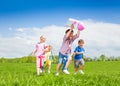 Happy boy holding rocket carton toy and kids run Royalty Free Stock Photo