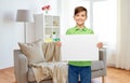 Happy boy holding white blank paper sheet at home Royalty Free Stock Photo